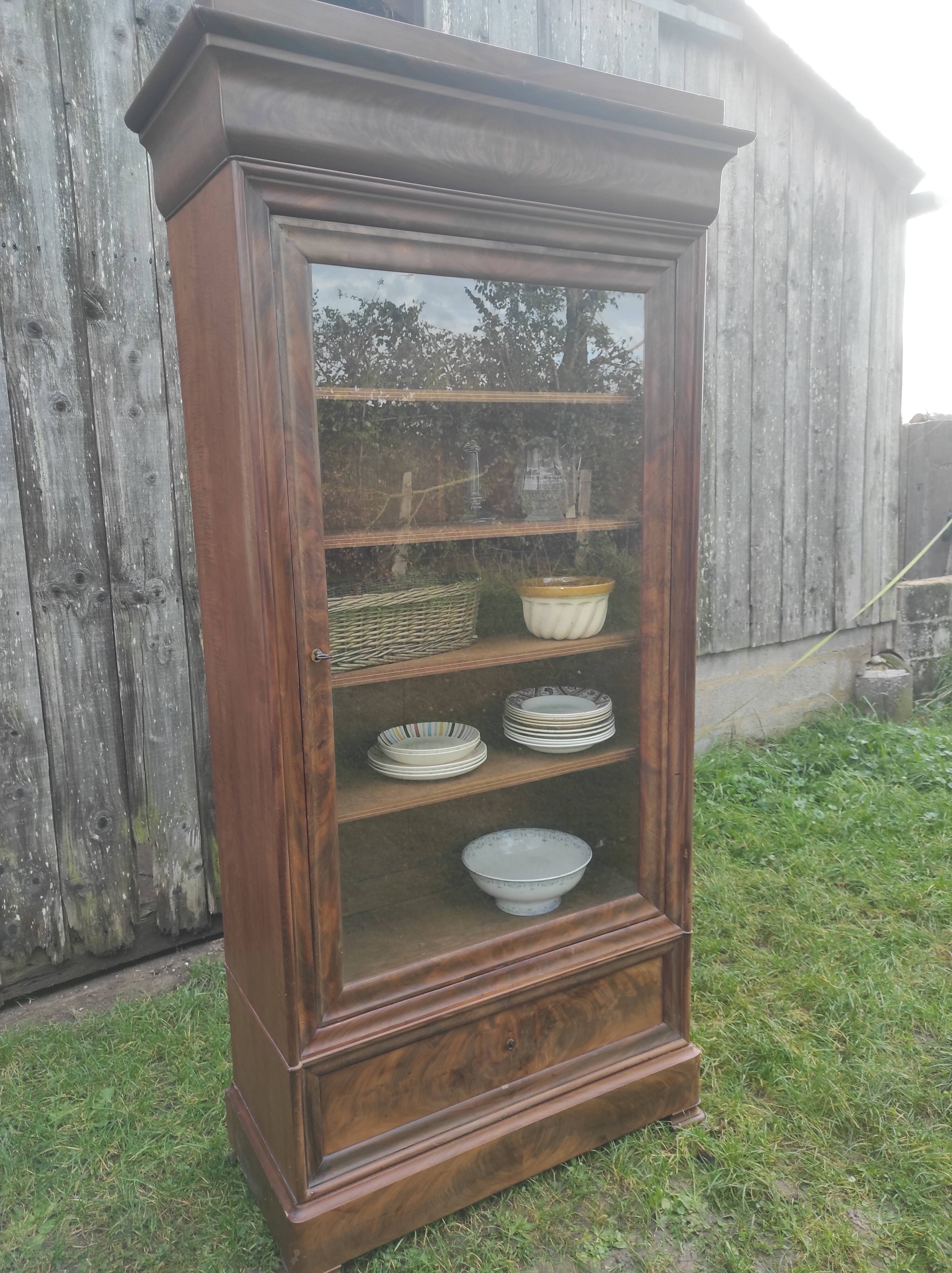 Parisian glass cabinet.