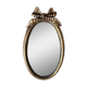 Old oval gilded stucco mirror