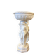 Vintage white concrete garden statue adorned with planter.