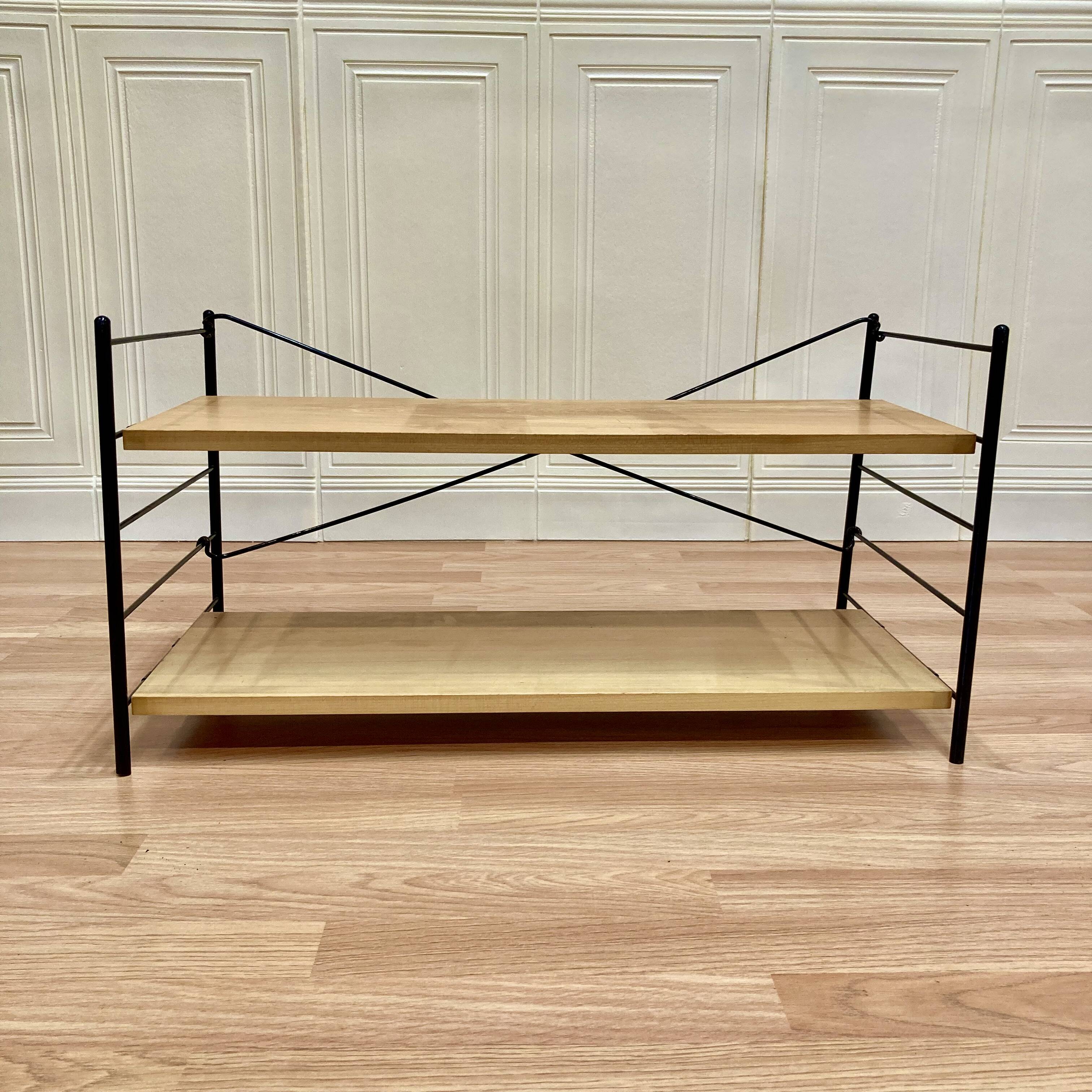 Modular metal and wood shelf design from the 1960s.