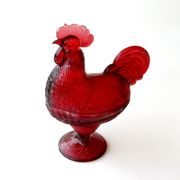 Old candy or sugar maker in red glass