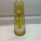 Decorated yellow glass pitcher