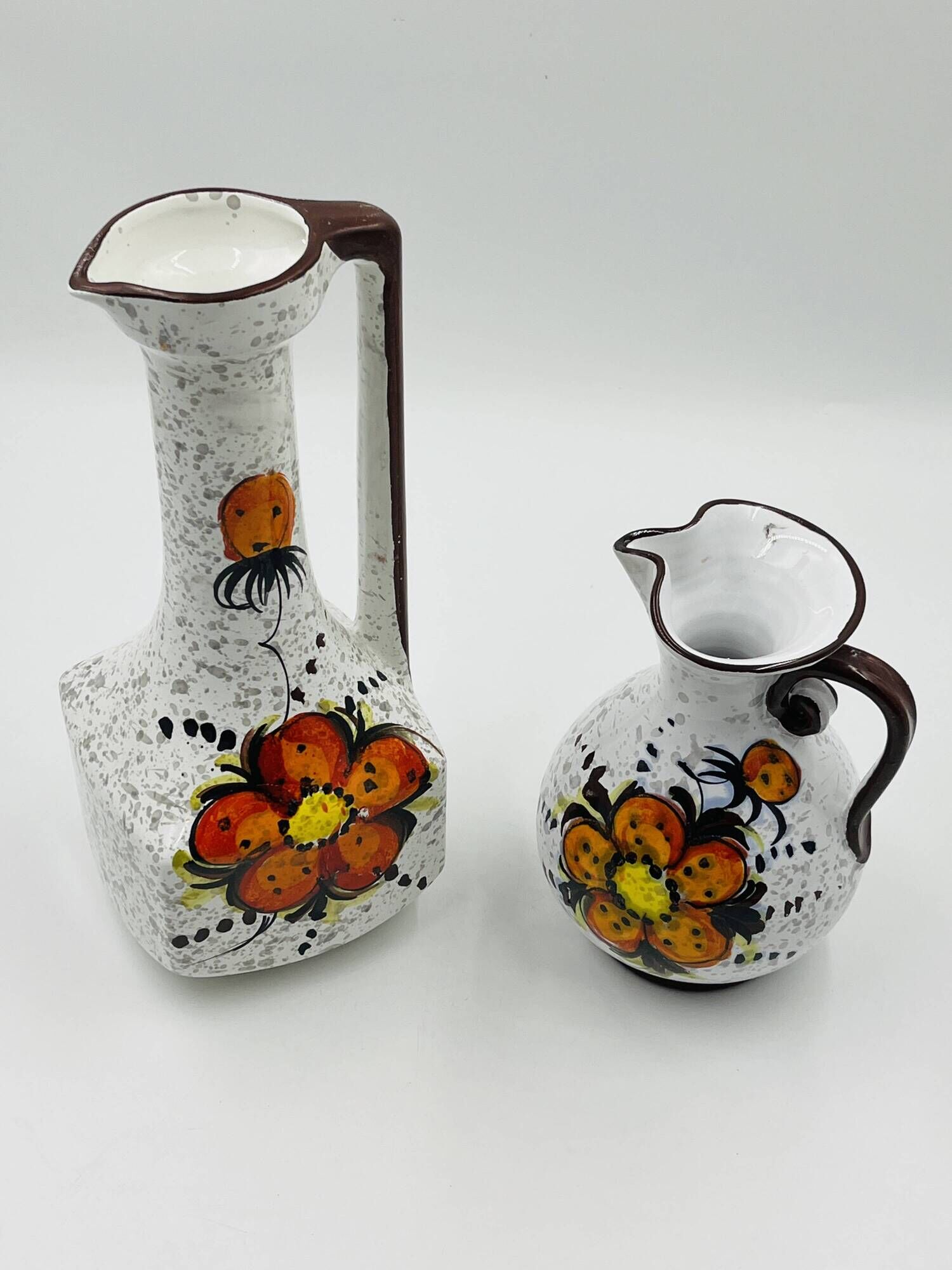 Pair of vintage hand-painted Italian floral vases