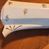 Coffee maker with floral decoration