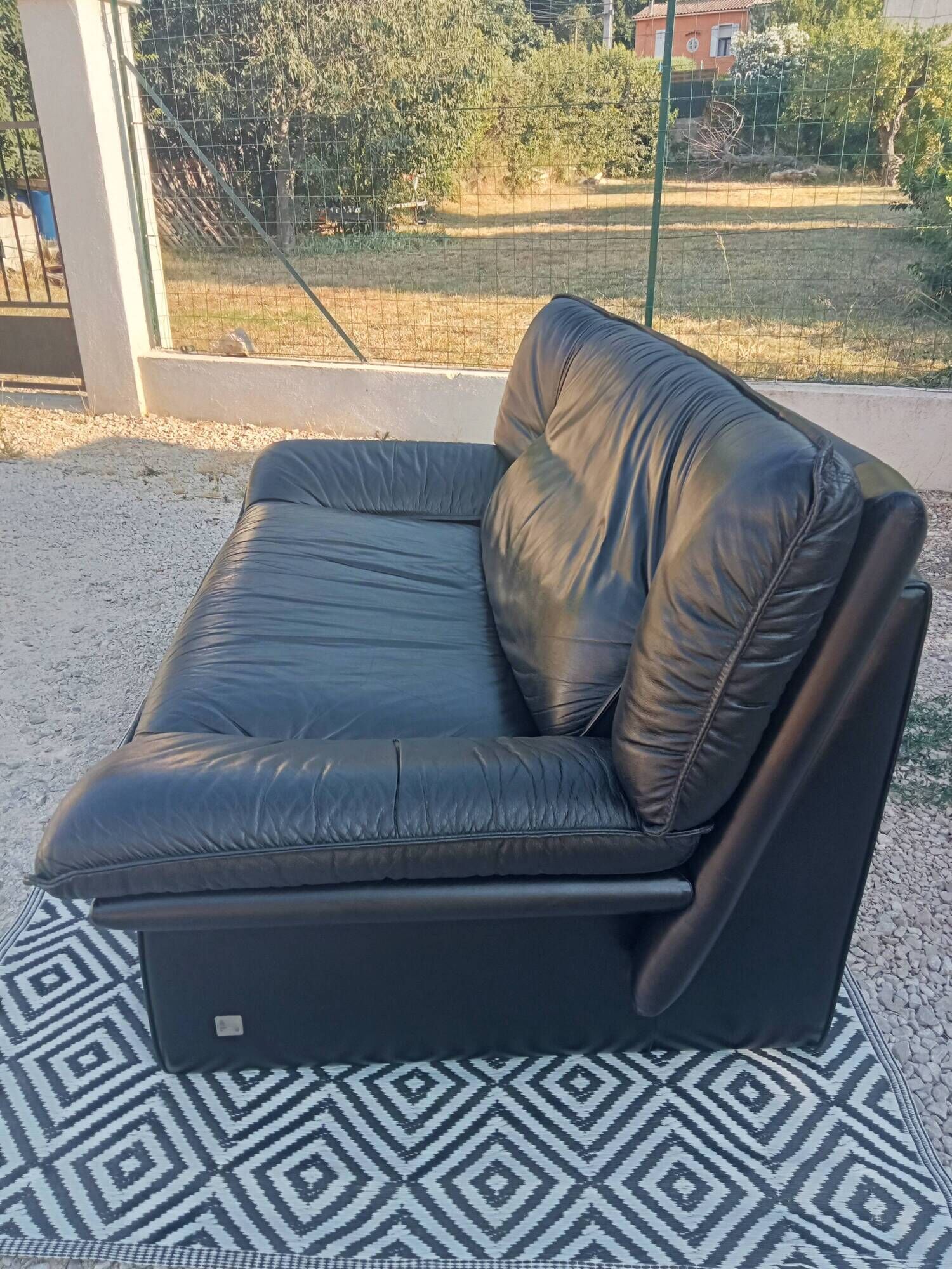 Vintage black leather sofa, 2 seater, Nicoletti Salotti