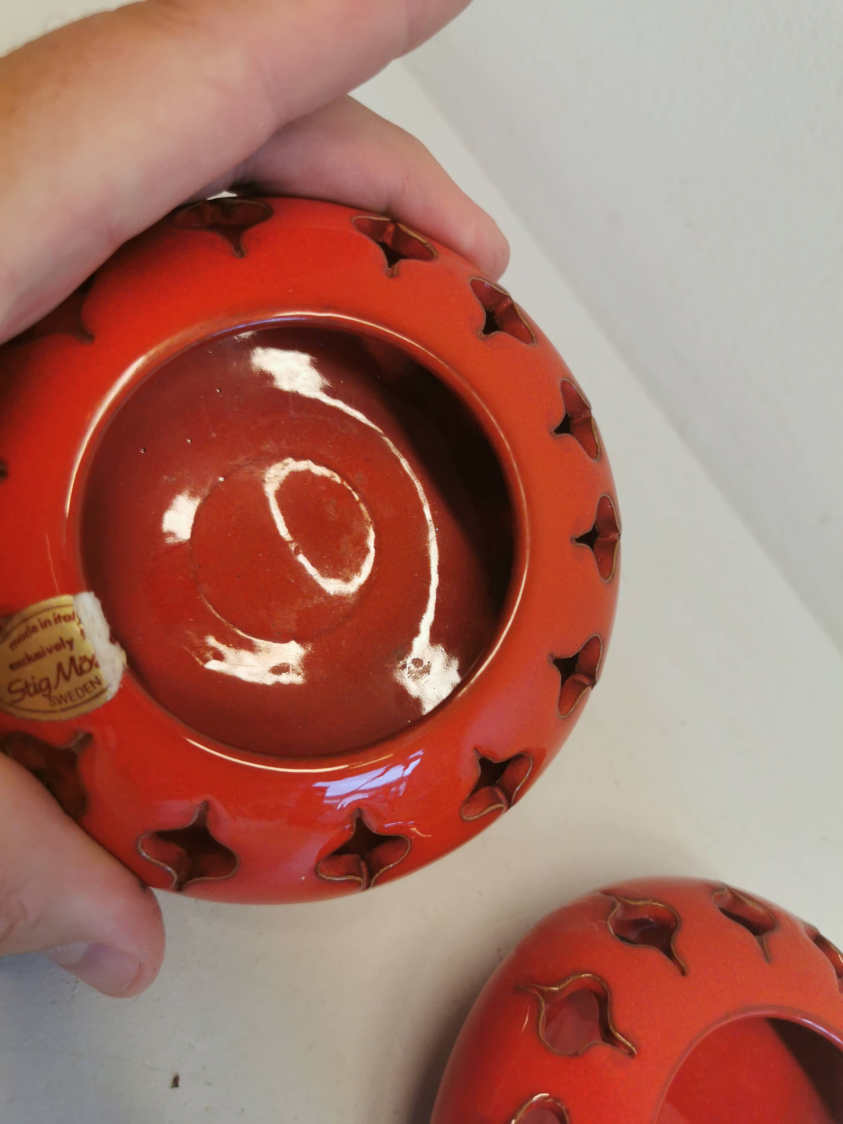 Pair of candle holders from the 1960s-1970s, crafted in red ceramic