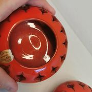 Pair of candle holders from the 1960s-1970s, crafted in red ceramic
