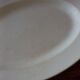Very large oval opaque porcelain dish from Lunéville 1880-1900.
