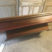 Coffee table with storage for bottles and glasses in oak.