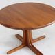 Table à manger ronde extensible vintage en teck massif des années 1960.