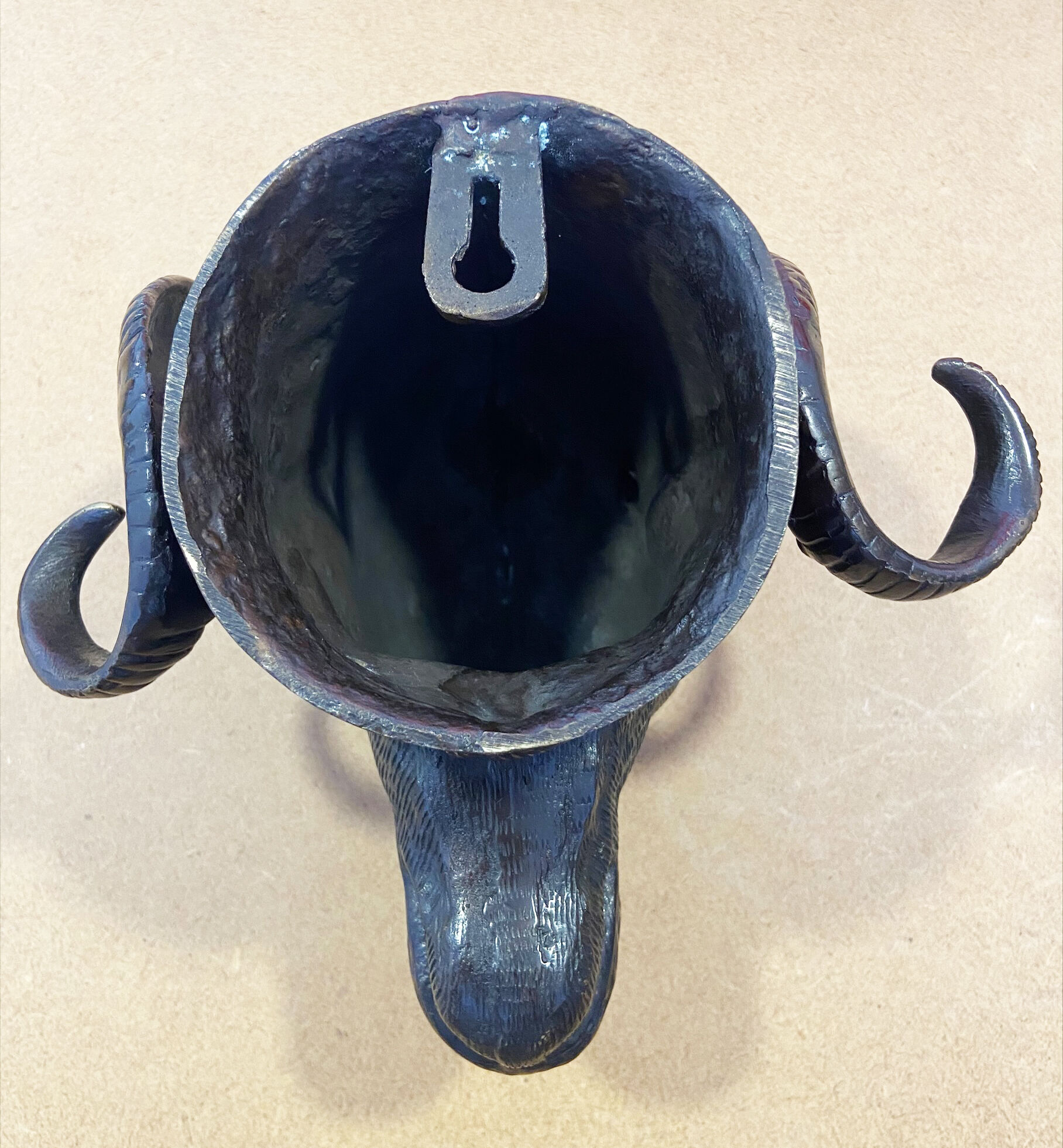 Bronze ram's head - 50s