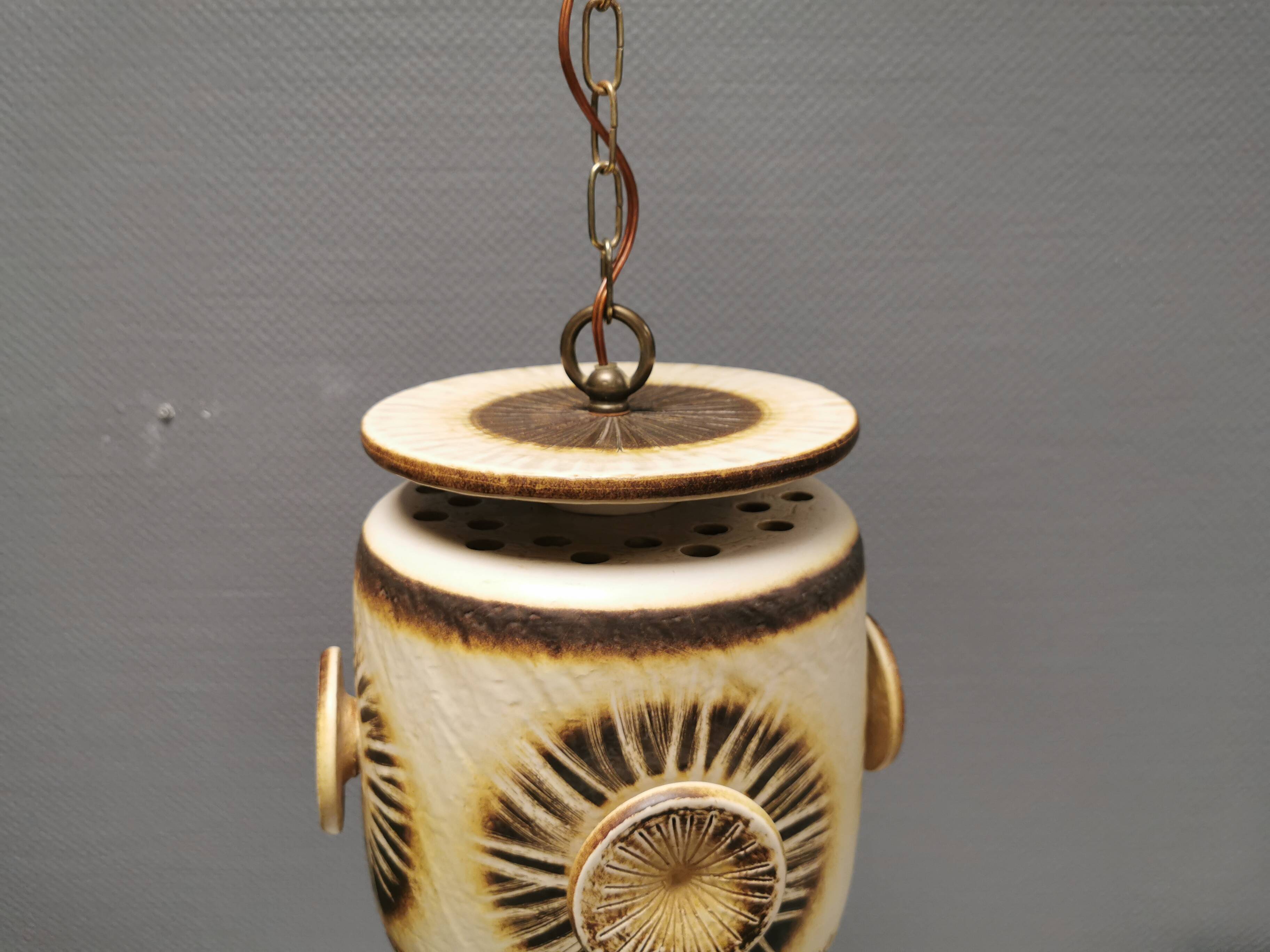 Large and beautiful hanging lamp in ceramic. Danish from the 70s, in super nice condition.