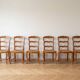 Set of 6 antique chairs in solid cherry wood and woven straw.