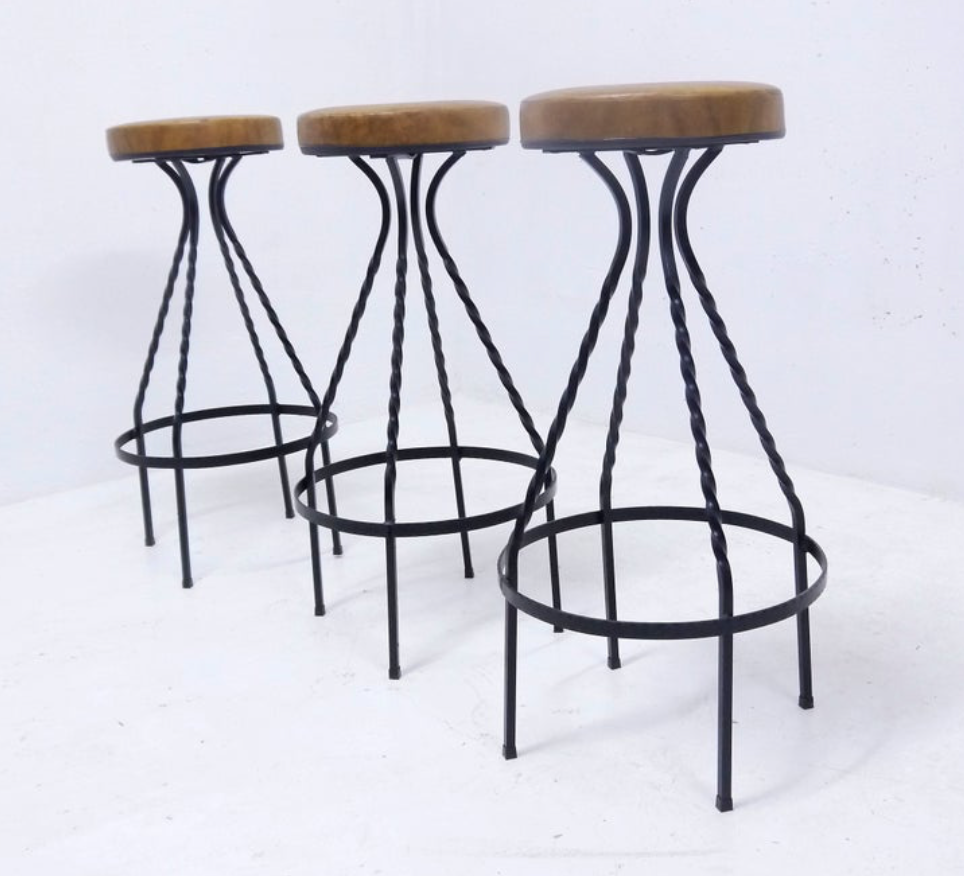 Footswith e.g. wrought iron feet and 60s vinyl seating