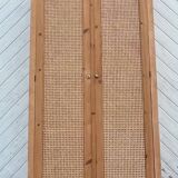 Renovated antique wardrobe in raw wood and caning.