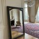 Miroir vintage glace biseautée en bois noir et doré