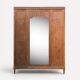 Art deco wardrobe in raw oak with bevelled mirror.