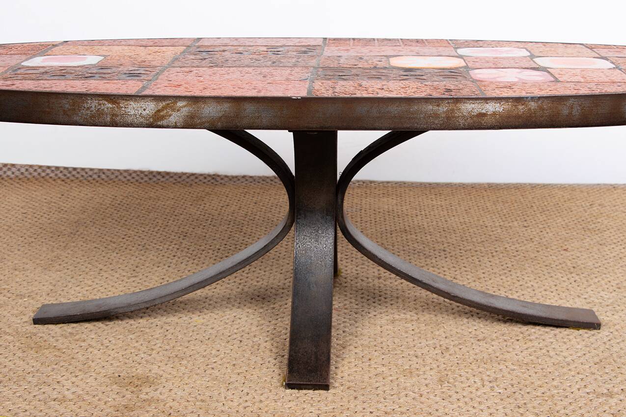 Lava stone, ceramic and steel coffee table by Jean Jaffeux 1960.