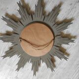 Sun mirror and witch's eye in gilded wood