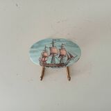 Vintage wall coat hook in brass and Bakelite.