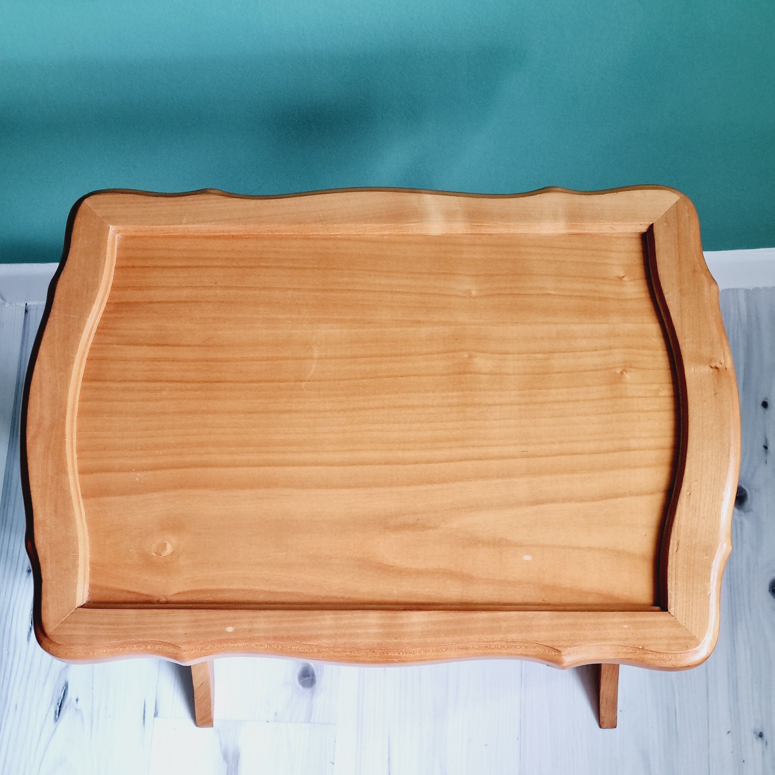 Side table with wooden and cane magazine holder