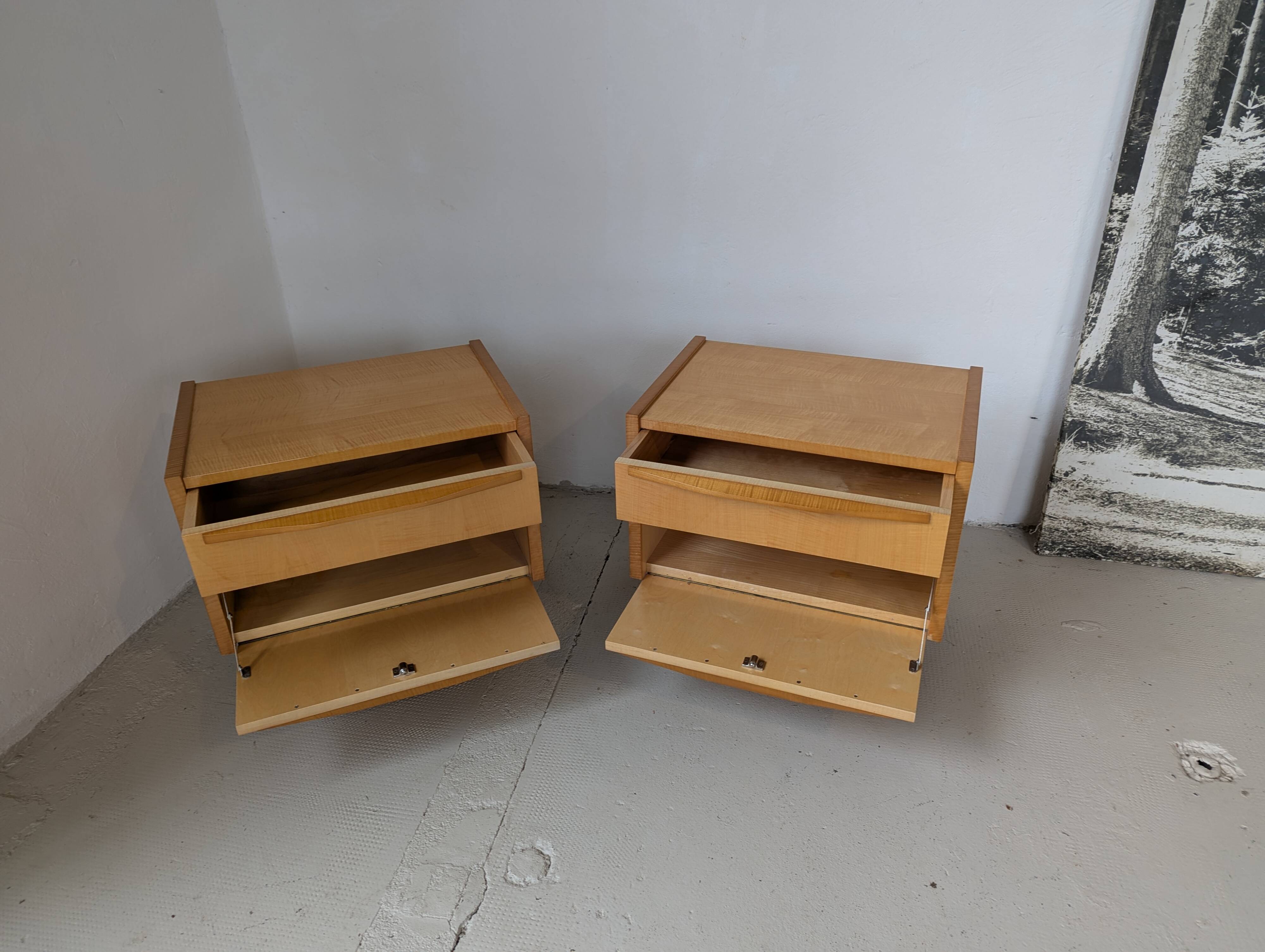 Pair of bedside tables in light wood