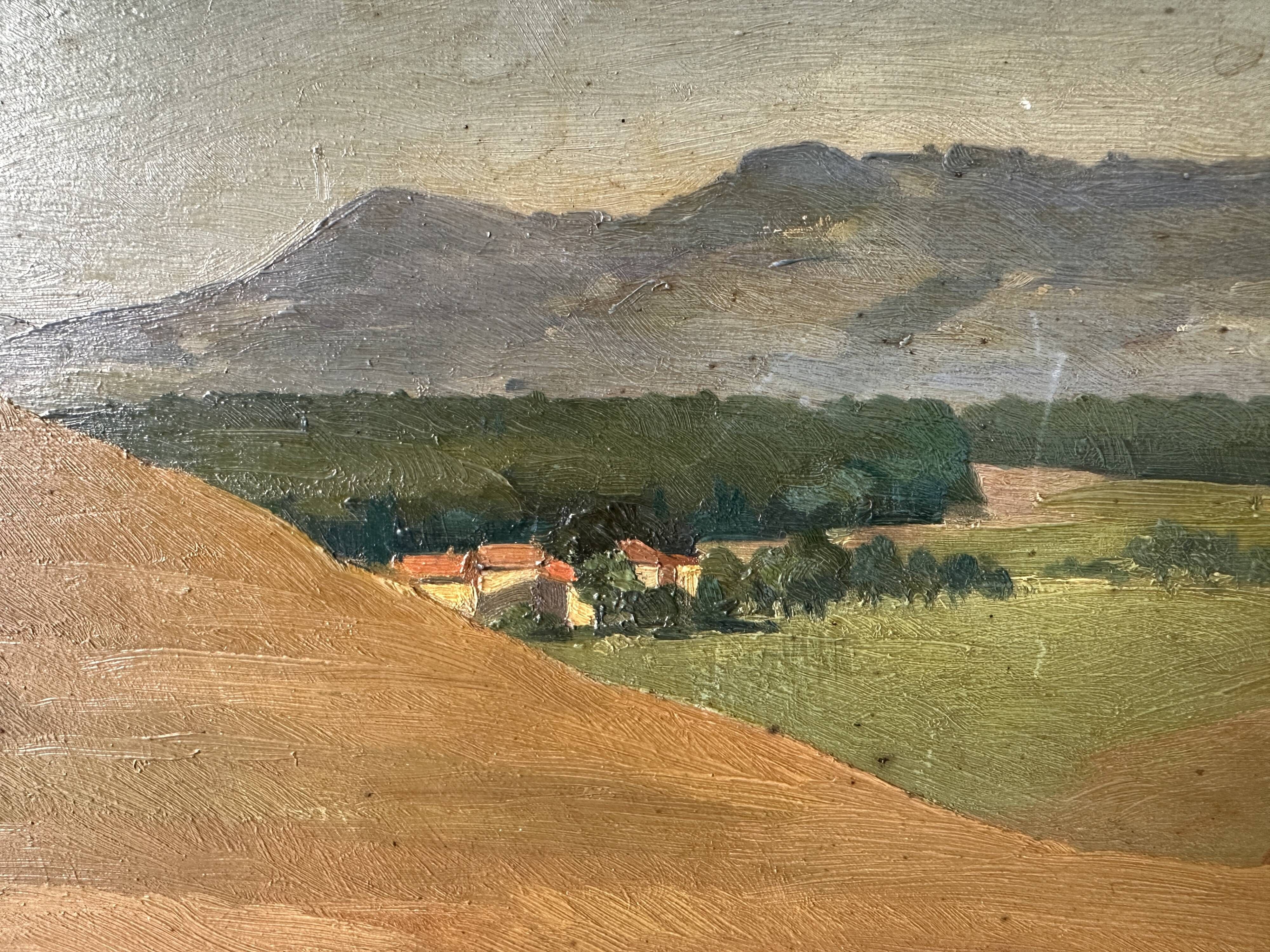 Old oil painting of a landscape on panel from 1920, haystacks.