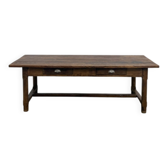 Authentic French farmhouse table from 1890 in solid oak with two drawers.