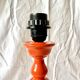 Large vintage lamp base in orange lacquered wood
