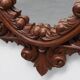 French Carved Walnut Oval Mirror with Pierced Acanthus Crest, circa 1900