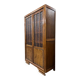 Vintage wooden display cabinet with textured glass.