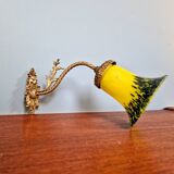 Wall sconce in gilded bronze and yellow/blue speckled glass
