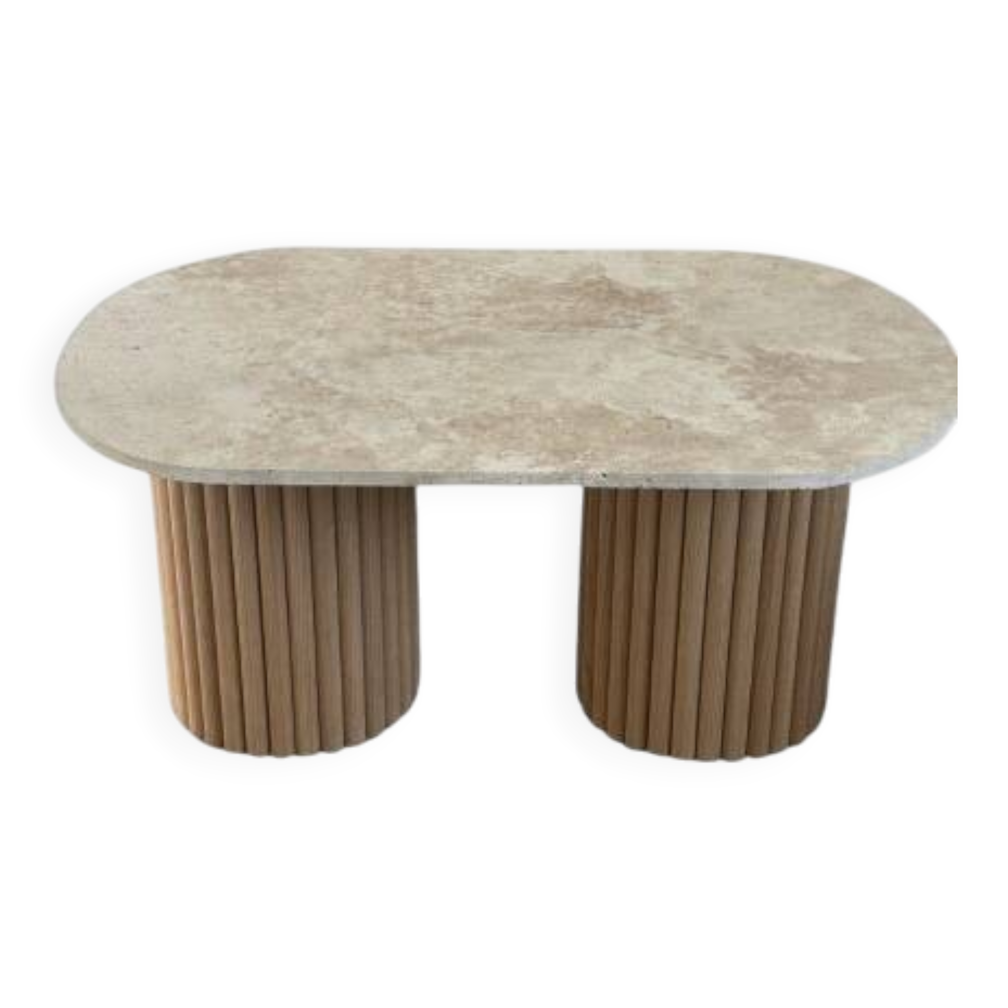 Oval coffee table in travertine and raw fluted wood.