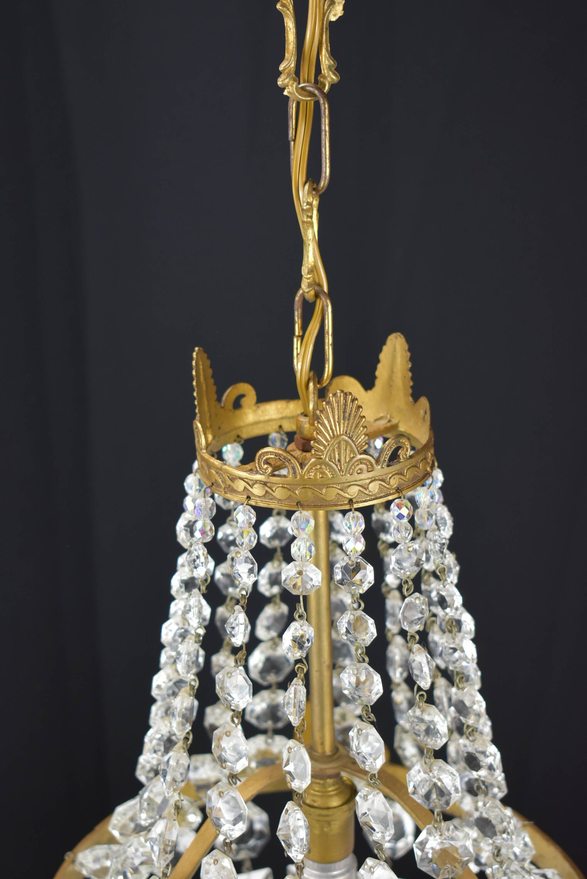 Hot air balloon chandeliers with glass tassels.