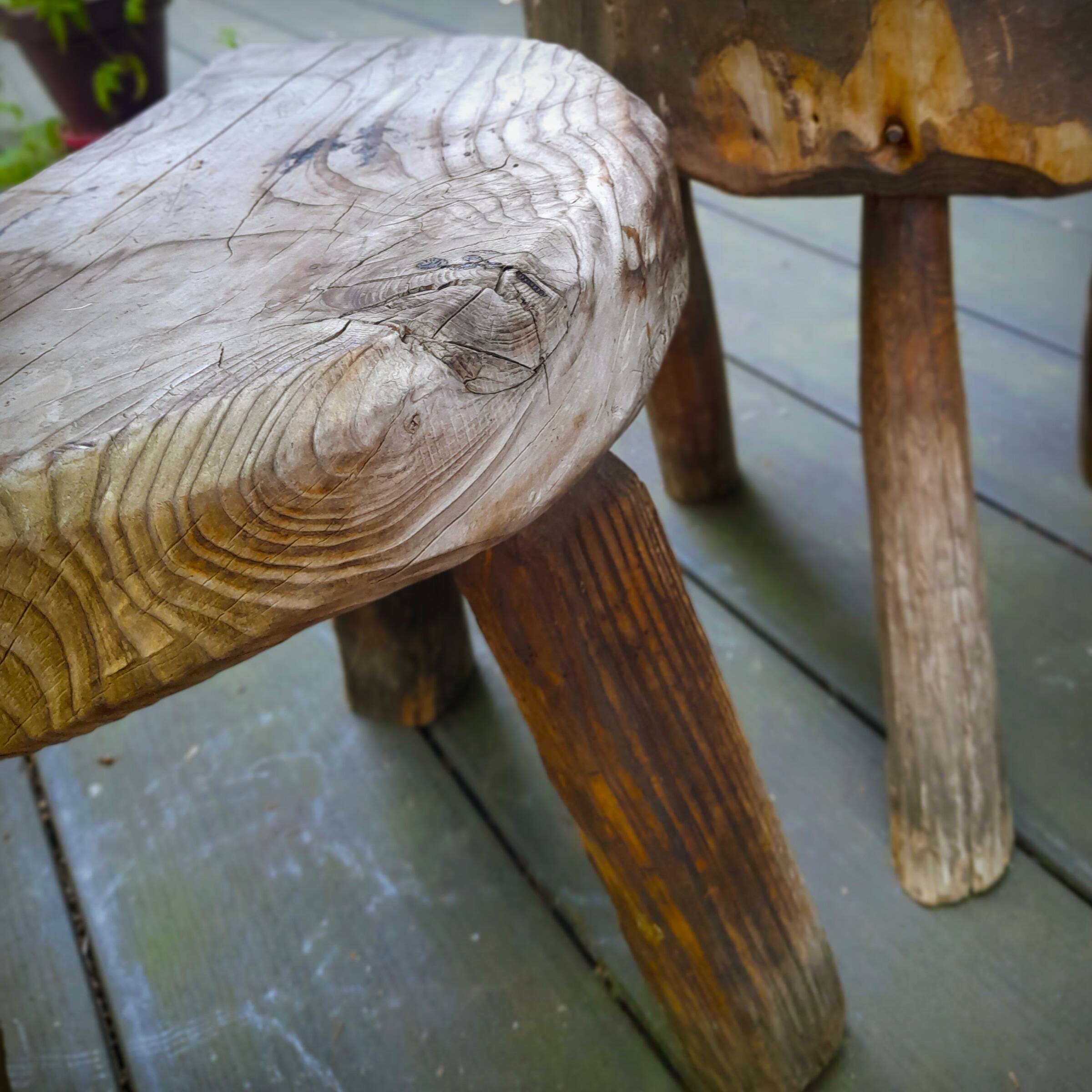 Pair of brutalist tripod stools in grayed pine. France, 1950s