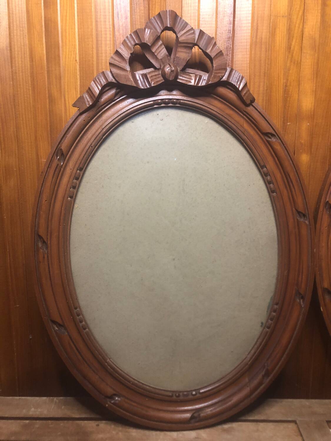 Old carved wooden medallion frame