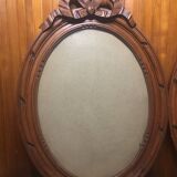 Old carved wooden medallion frame