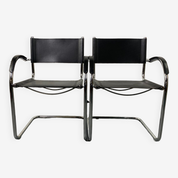 Pair of design armchairs in imitation leather chrome