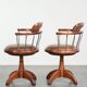 Set of 2 swivel/office chairs with a cognac-coloured cow leather seat