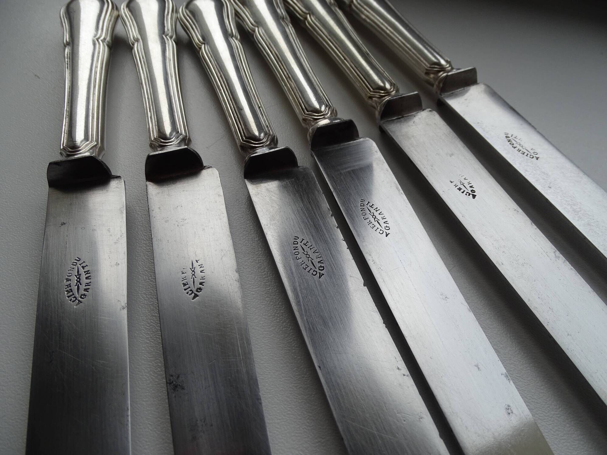 12 antique Art Deco knives silver metal and molten steel blades