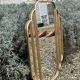 Art Deco style mirror in patinated gold iron 85 x 60 cm