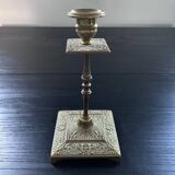 Chiseled brass candle holder