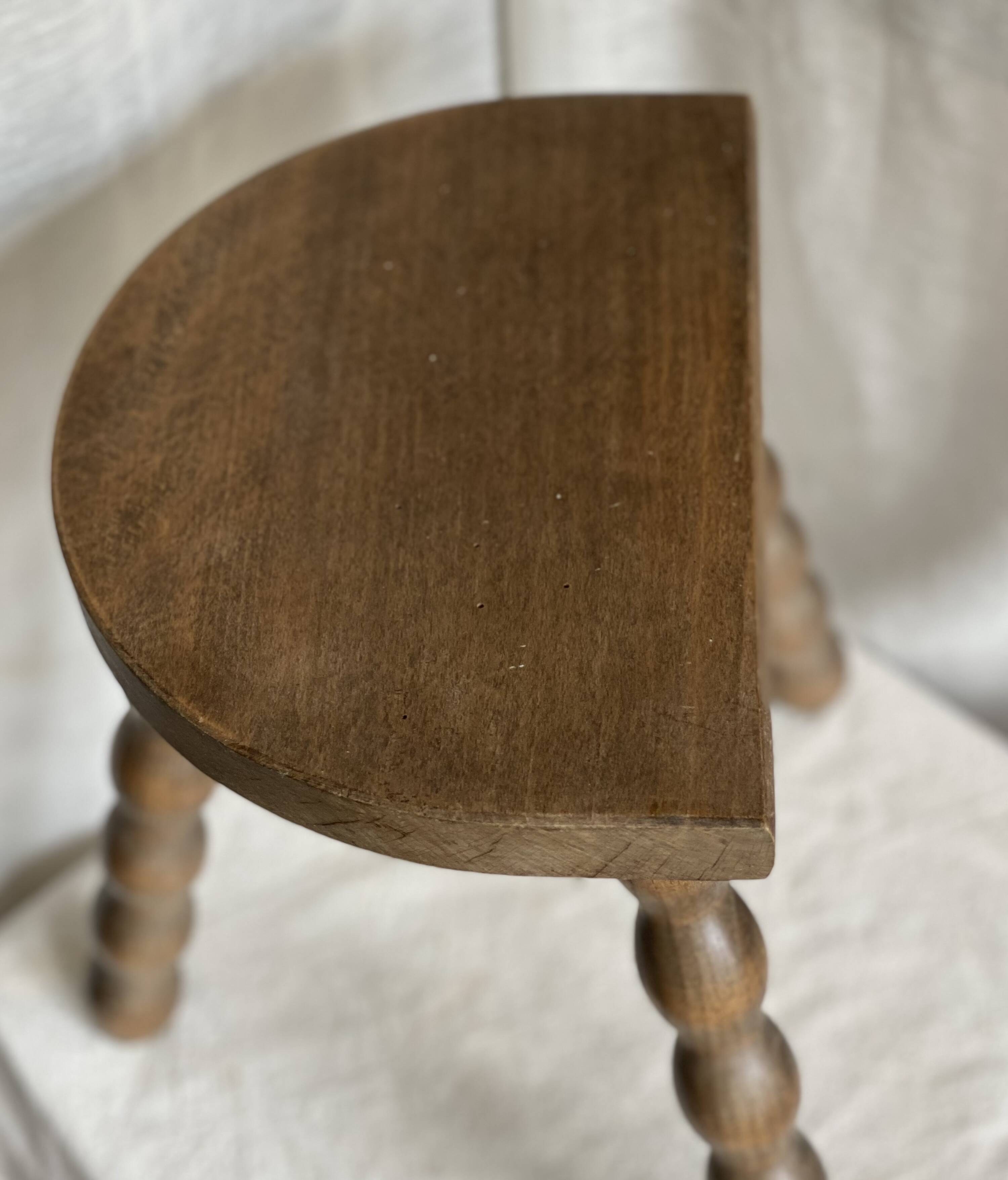 Vintage 1950s half-moon tripod stool