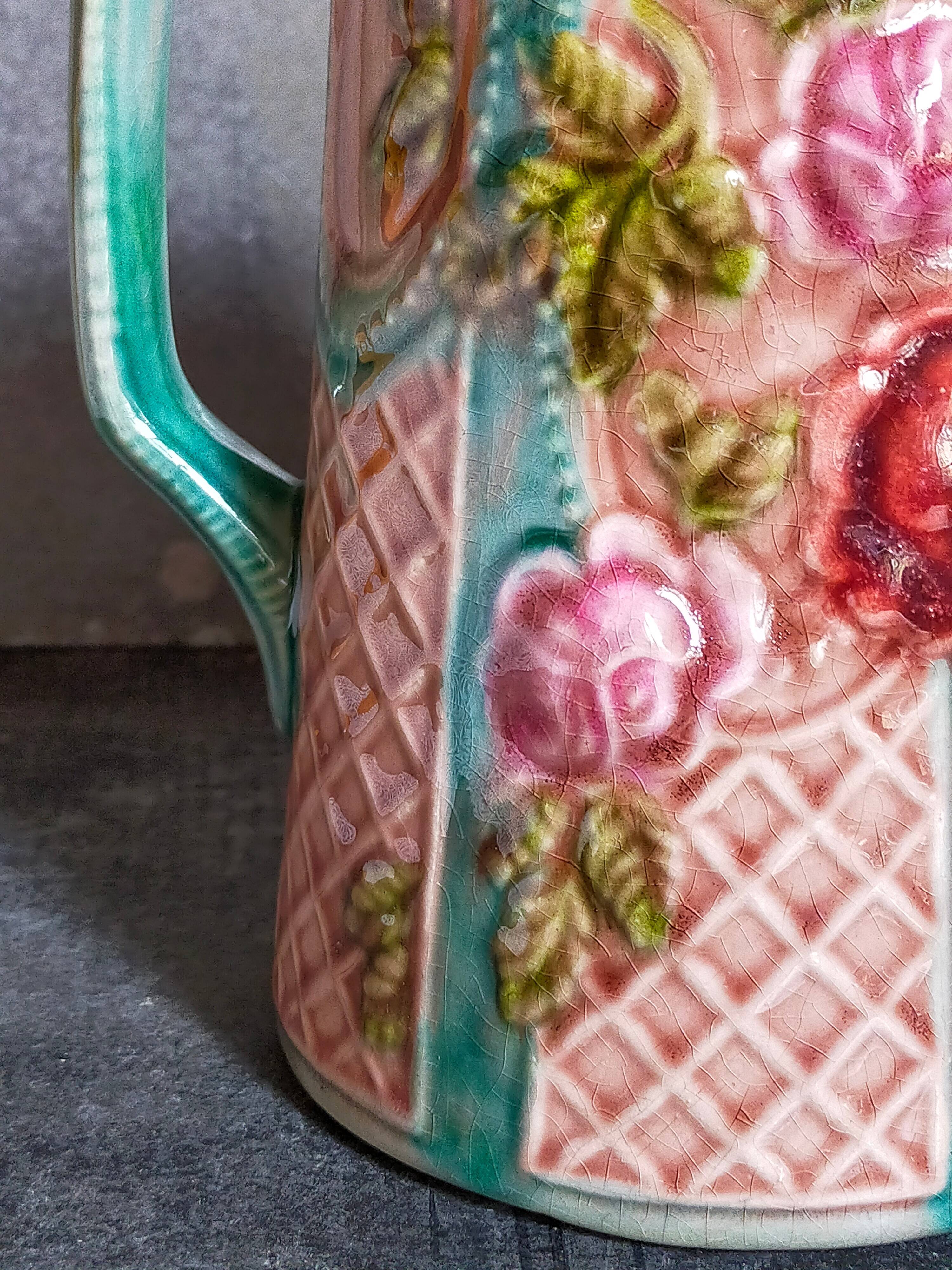 Antique slip pitcher with blooming roses