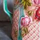 Antique slip pitcher with blooming roses