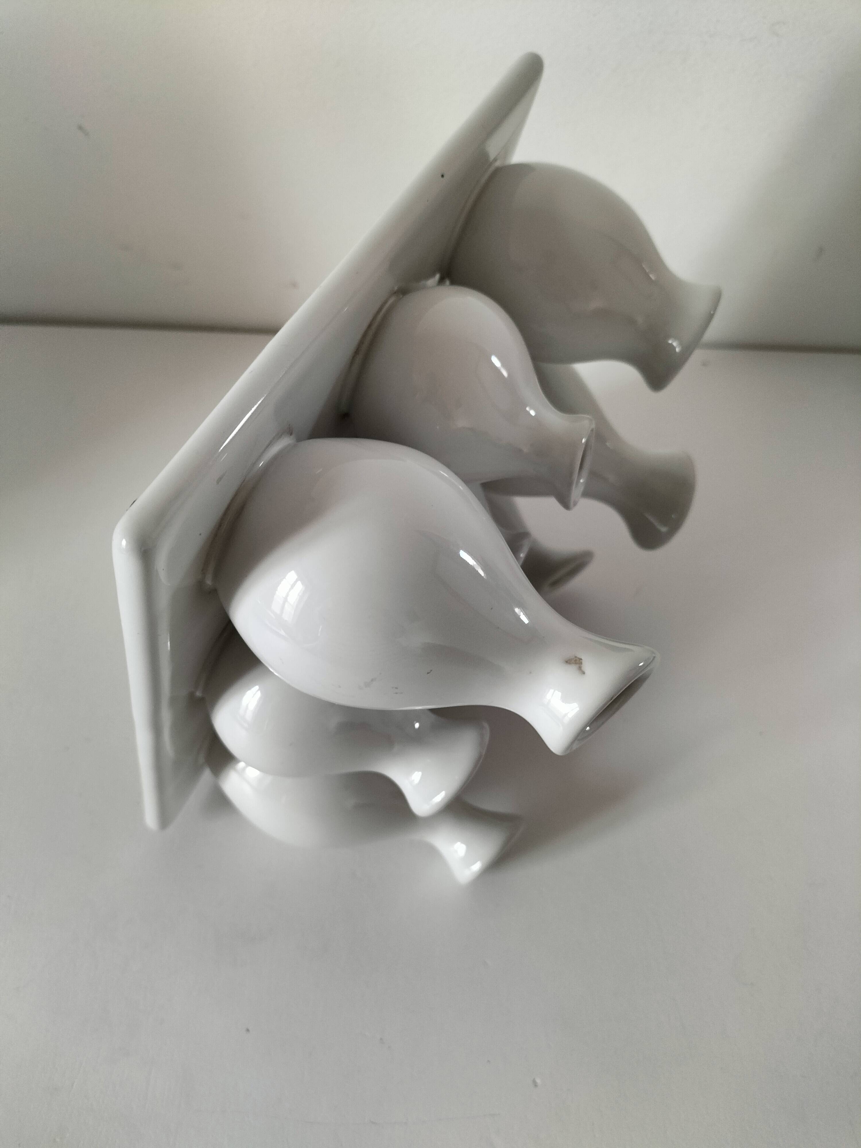 Multiple vintage white soliflore – centrepiece with 9 ceramic vases