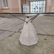 1980s table with a marble and steel base and a square glass top.