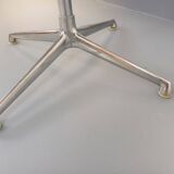 Vintage Eames round table for Vitra in white melamine, wood, and metal.