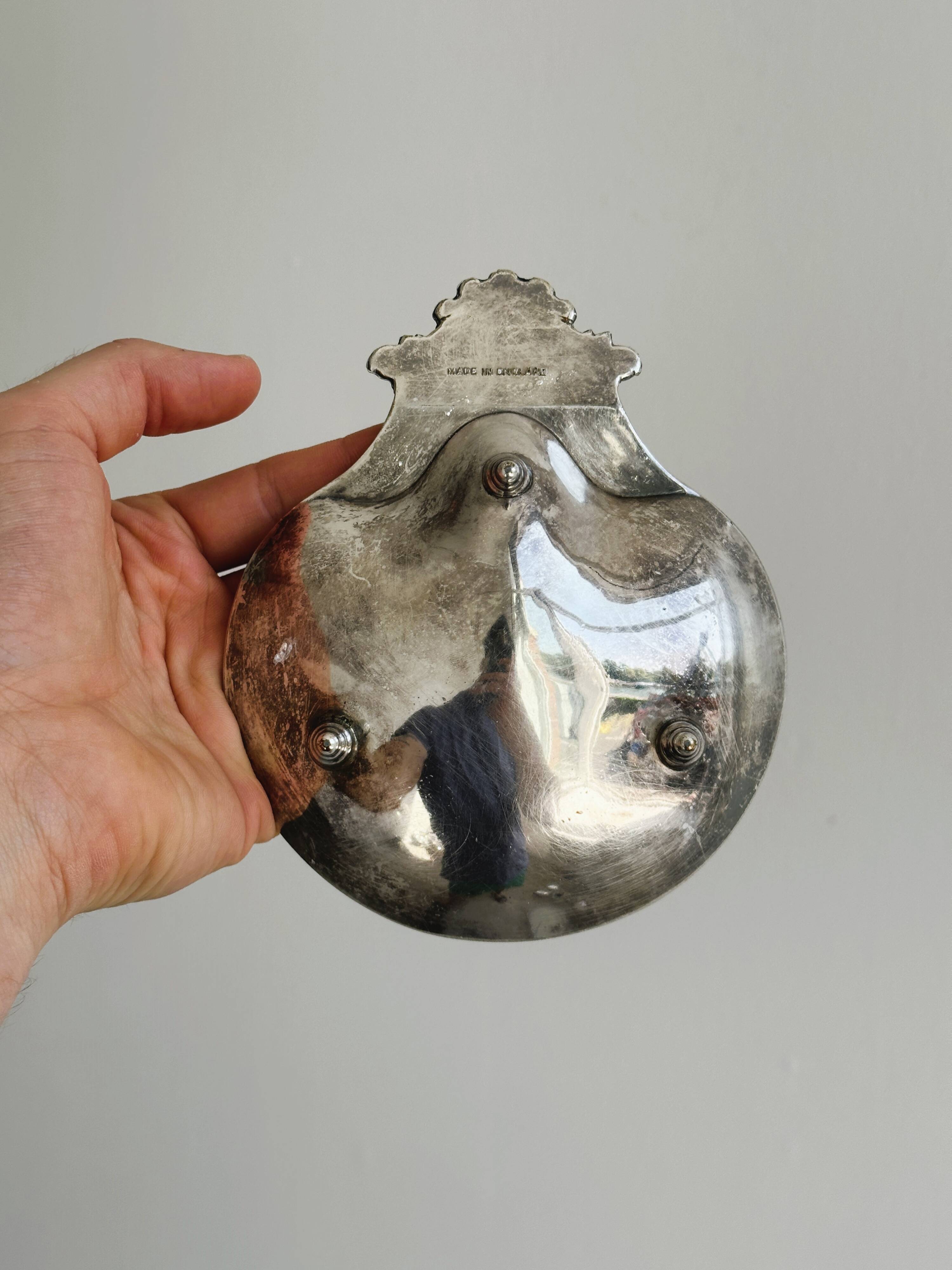 Metal shell pocket emptier