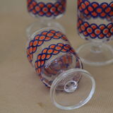 Blue and orange patterned foot glasses set